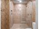 Walk-in shower with tile walls and glass door in a bathroom at 100 Blue Lake Ct, Longwood, FL 32779