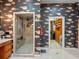 Large primary bathroom with a walk-in shower and spacious walk-in closet at 100 Blue Lake Ct, Longwood, FL 32779