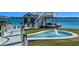 Private dock with boat lift and charming gazebo overlooking the water at 100 Blue Lake Ct, Longwood, FL 32779