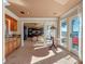 Home office with wet bar, ample natural light, and access to an outdoor balcony at 100 Blue Lake Ct, Longwood, FL 32779