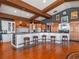 Gourmet kitchen with large island, bar seating, and pendant lighting at 100 Blue Lake Ct, Longwood, FL 32779