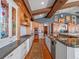 Spacious double kitchen layout featuring dual islands and custom cabinetry at 100 Blue Lake Ct, Longwood, FL 32779