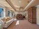 Large main bedroom with high ceilings, carpeted floors, and abundant natural light at 100 Blue Lake Ct, Longwood, FL 32779