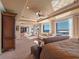 Bright and spacious main bedroom with large windows offering stunning water views at 100 Blue Lake Ct, Longwood, FL 32779