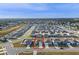Aerial view of a residential neighborhood with houses at 1224 Golden Eagle Ln, Winter Haven, FL 33880