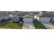Two-story house with gray siding and a two-car garage at 1224 Golden Eagle Ln, Winter Haven, FL 33880