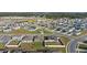 Aerial view of a residential neighborhood with houses at 1224 Golden Eagle Ln, Winter Haven, FL 33880