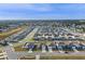 Aerial view of a residential neighborhood with houses at 1224 Golden Eagle Ln, Winter Haven, FL 33880
