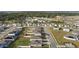 Aerial view of a residential neighborhood with houses at 1224 Golden Eagle Ln, Winter Haven, FL 33880