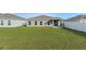 Spacious grassy backyard at 1224 Golden Eagle Ln, Winter Haven, FL 33880