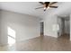 Spacious bedroom with tile floors and ceiling fan at 1224 Golden Eagle Ln, Winter Haven, FL 33880