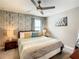 Spacious bedroom with a king-size bed and calming decor at 1670 Moon Valley Dr, Davenport, FL 33896