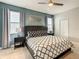 Spacious bedroom with king-size bed and en-suite bathroom at 1670 Moon Valley Dr, Davenport, FL 33896