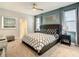 Bright bedroom with king-size bed and access to bathroom at 1670 Moon Valley Dr, Davenport, FL 33896