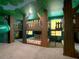 Jungle-themed bedroom with bunk beds, slide, and playful decor at 1670 Moon Valley Dr, Davenport, FL 33896
