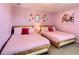 Bedroom with two twin beds and floral decor at 1670 Moon Valley Dr, Davenport, FL 33896