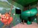 Jungle-themed bedroom with slide and playful decor at 1670 Moon Valley Dr, Davenport, FL 33896