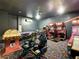 Fun game room featuring racing games, foosball, and air hockey at 1670 Moon Valley Dr, Davenport, FL 33896