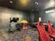 Game room with arcade games, air hockey and racing games at 1670 Moon Valley Dr, Davenport, FL 33896