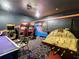 Fun game room with various arcade games and air hockey at 1670 Moon Valley Dr, Davenport, FL 33896