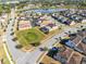 Aerial view of homes surrounding a pond at 181 Brookes Pl, Haines City, FL 33844