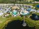 Community pool, water park, and residential buildings at 181 Brookes Pl, Haines City, FL 33844