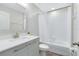 Clean bathroom with a bathtub, shower, and modern vanity at 181 Brookes Pl, Haines City, FL 33844