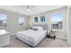 Spacious bedroom with a king-size bed and calming decor at 181 Brookes Pl, Haines City, FL 33844