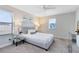Bright bedroom with a comfortable queen-size bed and en-suite bathroom at 181 Brookes Pl, Haines City, FL 33844