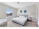 Bright bedroom with a king-size bed and window views at 181 Brookes Pl, Haines City, FL 33844