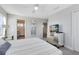 Comfortable bedroom with king-size bed and an ensuite bathroom at 181 Brookes Pl, Haines City, FL 33844