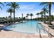 Resort-style pool with lounge chairs and palm trees at 181 Brookes Pl, Haines City, FL 33844