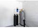 Basement with water heater, water softener, and filter at 181 Brookes Pl, Haines City, FL 33844