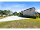 Sand volleyball court with a net and surrounding landscaping at 181 Brookes Pl, Haines City, FL 33844