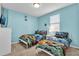 ' bedroom with twin beds and fun, ocean-themed bedding at 1840 Caribbean View Ter, Kissimmee, FL 34747