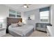 Main bedroom with king-size bed, crib, and plenty of storage at 1840 Caribbean View Ter, Kissimmee, FL 34747