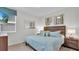 Bedroom with king-size bed and window at 1840 Caribbean View Ter, Kissimmee, FL 34747