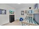 Bedroom with bunk beds, Mickey Mouse decor, and dresser at 1840 Caribbean View Ter, Kissimmee, FL 34747