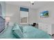 Bedroom with king-size bed and TV at 1840 Caribbean View Ter, Kissimmee, FL 34747