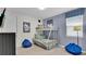 Bedroom with bunk beds, Mickey Mouse decor, and plenty of floor space at 1840 Caribbean View Ter, Kissimmee, FL 34747