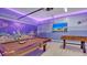 Game room featuring a pool table, foosball table and flat screen TV at 1840 Caribbean View Ter, Kissimmee, FL 34747