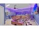 Fun game room with a pool table, foosball, and ocean theme at 1840 Caribbean View Ter, Kissimmee, FL 34747