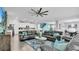 Spacious living room with comfortable seating and a large TV at 1840 Caribbean View Ter, Kissimmee, FL 34747