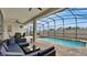 Relaxing pool area with patio furniture and a spa at 1840 Caribbean View Ter, Kissimmee, FL 34747