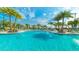 Expansive resort-style pool with plenty of lounge chairs at 1840 Caribbean View Ter, Kissimmee, FL 34747