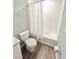Simple bathroom with a shower/tub combo and updated flooring at 2906 Fieldwood Cir, St Cloud, FL 34772