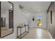 Bright and spacious entryway with tile flooring and modern console table at 3331 Private Oak Dr, Apopka, FL 32703