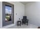Inviting front porch with a modern door and comfortable seating area at 3331 Private Oak Dr, Apopka, FL 32703