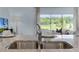 Modern kitchen with stainless steel sink and granite countertops at 3331 Private Oak Dr, Apopka, FL 32703