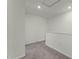 Bright and airy loft area with neutral carpeting at 3331 Private Oak Dr, Apopka, FL 32703